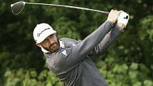 Dustin Johnson hits from the tee with his driver during a US Open practice round at Winged Foot.