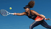 Naomi Osaka plays a forehand in her fourth round match against Garbine Muguruza during day seven of the 2021 Australian Open.