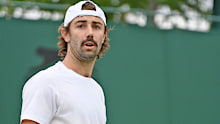 Jordan Thompson of Australia plays a forehand in his Men's Singles First Round match against Casper Ruud