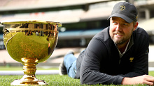 Marc Leishman cuts the grass on the MCG ahead of the 2019 Presidents Cup