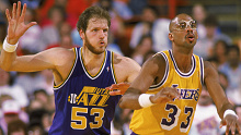 Mark Eaton of the Utah Jazz guards Kareem Abdul-Jabbar of the A Lakers during an NBA game in 1989.