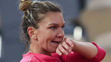French Open top seed Simona Halep reacts during her loss to Iga Swiatek.