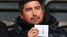 Harry Kewell at a Hibernian game, which increased speculation he may manage the club.