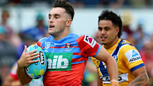 Newcastle Knights player Tex Hoy makes a break during the NRL Nines.