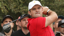 Patrick Reed hits his tee shot on the second hole on Sunday.