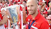 Jarrad McVeigh with the 2012 AFL Premiership trophy