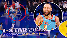 Steph Curry celebrates his half court shot. 