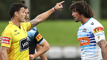 Referee Henry Perenara sends off Titans captain Kevin Proctor for his apparent bite of Shaun Johnson.