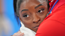 Simone Biles of Team US reacts during the Women's Team Final 