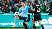 Alexander Baumjohann of Sydney FC controls the ball