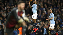 Raheem Sterling celebrates a goal in his hat-trick vs Watford.