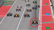 Oscar Piastri leads the field into the first corner of the Spanish Grand Prix.