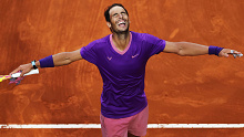 Rafael Nadal celebrates winning match point over Novak Djokovic in the Italian Open.