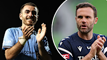Sydney FC's Victor ﻿Campuzano (L) and Melbourne Victory's Juan Mata (R).