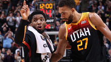 Donovan Mitchell #45 talks to Rudy Gobert #27 of the Utah Jazz 