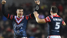Roosters stars Joseph Manu and Brett Morris celebrates victory in the World Club Challenge.