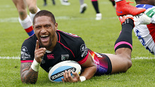 New Zealand Warriors icon Manu Vatuvei scores a try in his legendary 226-match career.