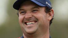 Patrick Reed celebrates with the trophy after winning the Farmers Insurance Open at Torrey Pines.