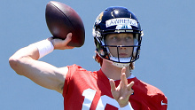 Trevor Lawrence #16 of the Jacksonville Jaguars participates in drills during a minicamp.
