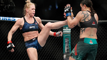Holly Holm kicks Raquel Pennington during a UFC 246 women's bantamweight