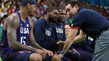 USA head coach Mike Krzyzewski talks with Carmelo Anthony, Kyrie Irving and Kevin Durant during the gold medal game at the Rio 2016 Olympics.