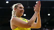 Donnell Wallam applauds the crowd after her game-winning heroics