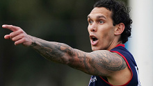 Harley Bennell runs with the ball during an AFL Melbourne Football Club training session 