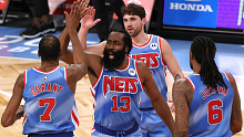 Kevin Durant #7 and James Harden #13 high-five as the Nets beat the Magic.
