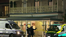 Police discovered the woman's body in a bedroom around 6pm last night.