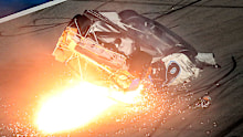 Ryan Newman slides down the track after he was involved in a crash on the final lap of the NASCAR Daytona 500