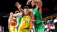 Dante Exum of Australia takes on the defence of Jahlil Okafor of Nigeria during the preliminary rounds of the Men's Basketball match between Australia and Nigeria on day two of the Tokyo 2020 Olympic Games at Saitama Super Arena on July 25, 2021 in Saitama, Japan. (Photo by Bradley Kanaris/Getty Images)