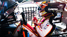Scott McLaughlin sits in his car at the Gold Coast 600, where he suffered a massive crash.