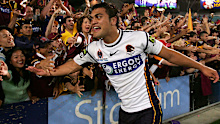 Karmichael Hunt celebrates after winning the 2006 NRL grand final with the Brisbane Broncos.