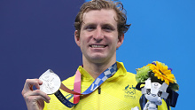 Jack McLoughlin of Team Australia poses with the silver medal for the Men's 400m Freestyle.