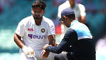 India wicketkeeper-batsman Rishabh Pant receives treatment on his left arm after being hit by a Pat Cummins delivery during the 2020-21 summer.