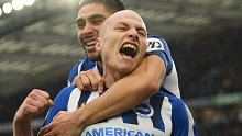 Aaron Mooy celebrates his superb goal.