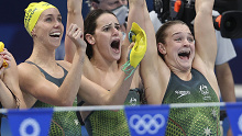 Emma McKeon, Kaylee McKeown and Chelsea Hodges celebrate Australia's ninth swimming gold medal at the Tokyo Olympics, in the 4x100m medley relay.