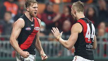 Essendon's James Stewart (L) will be quarantined.