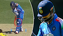 Virat Kohli is trapped in front and walks off. 