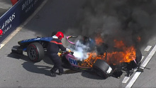 Jack Doohan's car on fire after his crash in the F2 race at the Monaco Grand Prix.