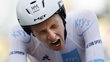 Tadej Pogacar grimaces during the time trial in the penultimate stage of the Tour de France.