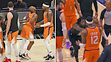 Patrick Beverley #21 of the LA Clippers is held back after pushing Chris Paul #3 of the Phoenix Suns to the ground 