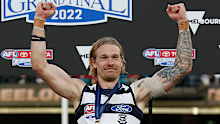 Geelong star Tom Stewart celebrates the 2022 premiership win