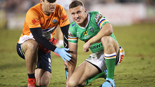 Jack Wighton receives attention from the trainer during Raiders vs Knights.