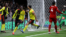 Watford's Ismailia Sarr (2L) celebrates one of his goals in an EPL win over Liverpool.