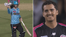 Hugh Weibgen asks for new gloves as Joel Davies laughs.