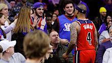 Thomas walked into the stands to confront the unruly fan before being ejected from the remainder of the game