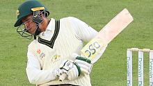 Australia A batsman Usman Khawaja evades a bouncer against England Lions at the MCG.