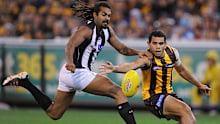 Heritier Lumumba (left) and Cyril Rioli contest for the ball.