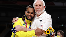 Patty Mills and Gregg Popovich.